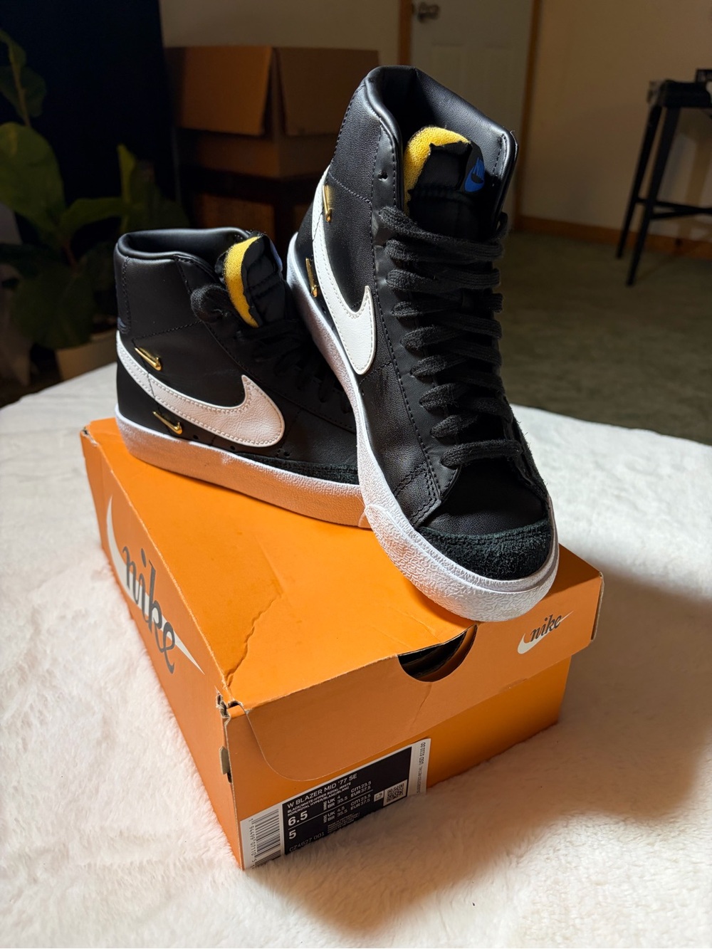Nike Kids Black and White High-Top Sneakers with Yellow Tongue Accents
